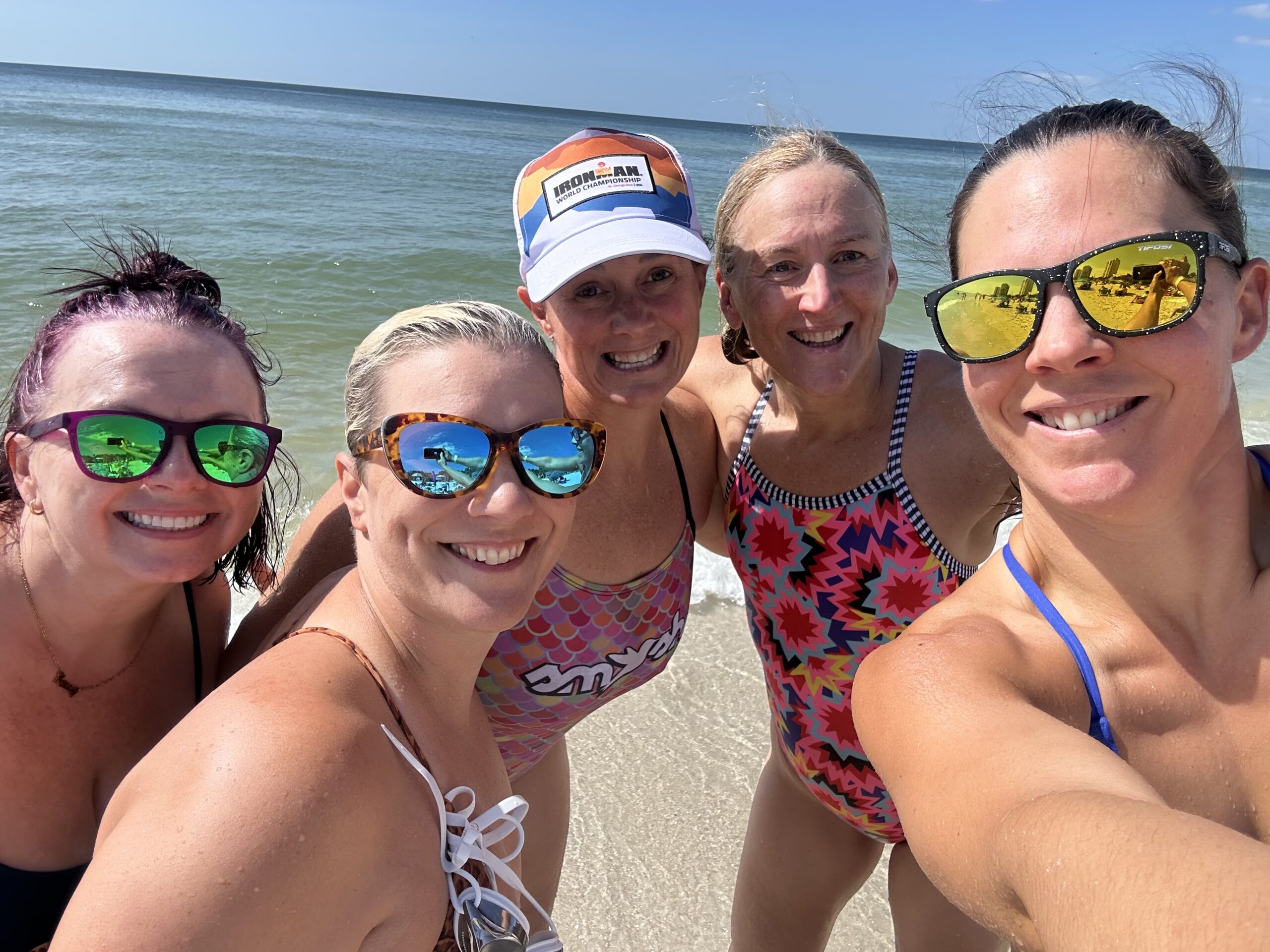 Picture of the author and teammates open water swimming at swim camp 